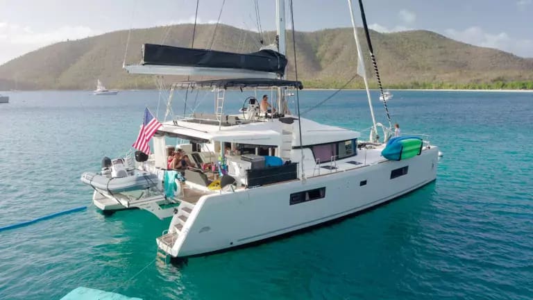 Charter Catamaran, ISLAND HOPPIN, Accommodates 8 guests in 4 ensuite cabins. All Inclusive week charters in the BVI starting at $27,000. Captain and Chef Onboard.